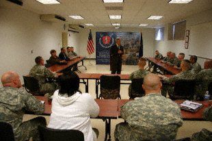 U.S. Representative Baron Hill addresses the first graduates of the Patriot Academy High School located at the Muscatatuck Urban Training Center in Butlerville, Ind. The former dropouts shared their individual challenges and triumphs with Hill as he encouraged them to set even higher goals. Hill and his staff, who have visited the campus several times since its inception, declared the "experiment" a complete success. 